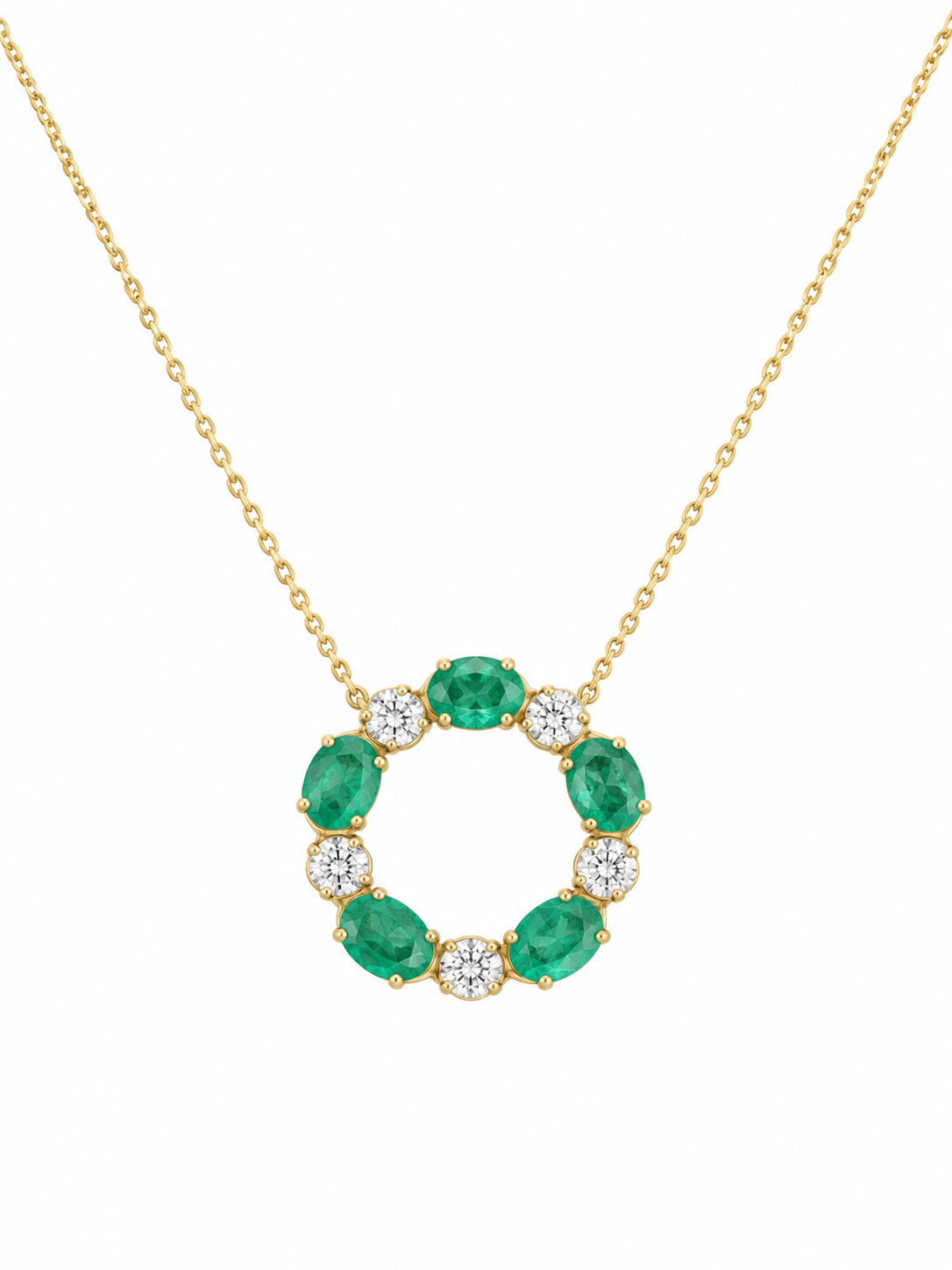 Colgante circular con esmeraldas ovaladas y diamantes alternados en oro de 18K, con cadena incluida