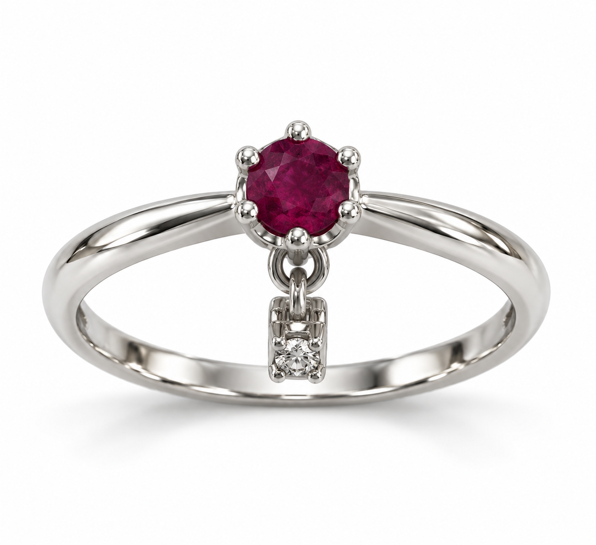Anillo de oro blanco con rubí central y detalle colgante con diamante